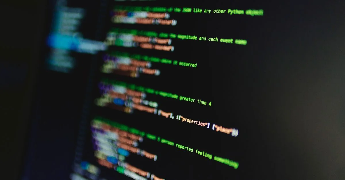 Lignes de code colorées sur un écran d'ordinateur mettant en valeur la programmation et la technologie.